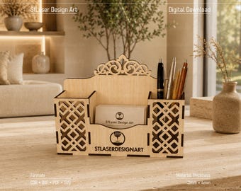 May include: A light-colored wooden desk organizer featuring two side compartments with a geometric lattice pattern, a central slot for cards, and a decorative arched top. The front displays the text StLaserDesignArt and a circular logo icon.