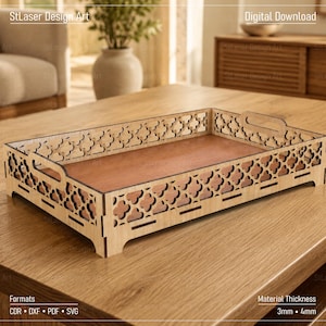 May include: A rectangular wooden tray featuring a laser-cut quatrefoil pattern on the side walls and integrated handles. The base is a solid flat panel. Text on the image indicates digital download formats including CDR, DXF, PDF, and SVG.