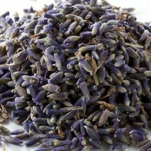 May include: A close-up of dried lavender buds, a purple and brown herb used for aromatherapy and crafts.
