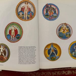 May include: A book page featuring colorful illustrations of planetary seals. Each circular design depicts a human figure with celestial elements, surrounded by intricate borders. The artwork is reminiscent of historical manuscript illuminations.