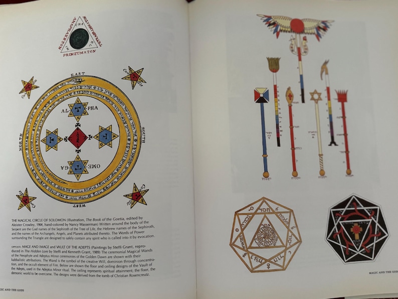 May include: Two-page spread from a book featuring illustrations of esoteric symbols and diagrams. The left page displays a circular diagram with stars and text, while the right page shows various ceremonial staffs and geometric shapes.
