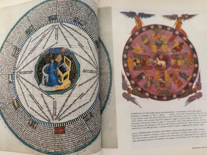 May include: Two-page spread from a book featuring medieval illustrations. One page displays a detailed circular diagram with text and geometric lines. The other page shows a colorful zodiac wheel with figures and text, with angel figures at the top.