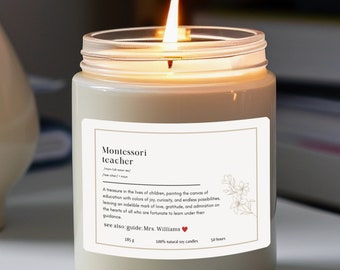 May include: A white soy candle with a label that reads "Montessori teacher" and a description of the role. The label also includes the text "see also: guide: Mrs. Williams".