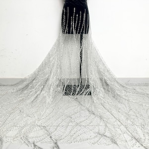 Heavy beaded sequin beaded lace fabric,ivory mesh fabric,suitable for dresses,tutus,prom dresses,costume fabrics