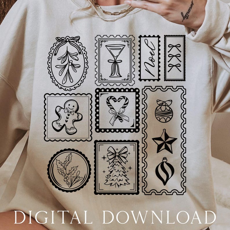 May include: Beige sweatshirt featuring a collection of black and white Christmas-themed postage stamp designs. The stamps depict festive elements like a gingerbread man, candy canes, and a Christmas tree. The text "DIGITAL DOWNLOAD" is at the bottom.