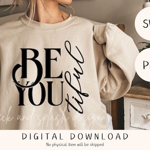 May include: A beige sweatshirt with the text "BE YOUtiful" in black lettering. The sweatshirt is being modeled by a person. The image is a digital download.