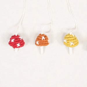 Mushroom Car Charm Ornament and Essential Oil Diffuser, yellow, copper, blue, and red colors