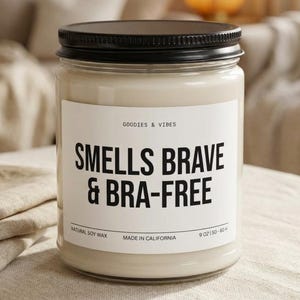 May include: A white ceramic mug with a black handle and the text "But First, Coffee" in a black, bold font. The mug is on a white surface. The mug is approximately 4 inches tall.