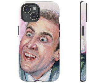 May include: A white phone case featuring a watercolor portrait of a man with wide eyes and an open mouth. The case has a black camera module and buttons on the side. The side view shows a colorful design.