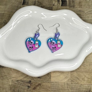 Skull love potion earrings!