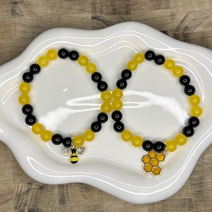 Bumble bee and honeycomb matching bracelets!
