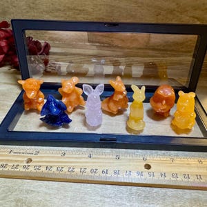 Winnie the Pooh complete set with floating display case. Winnie, eeyore, tigger, piglet, rabbit, owl, kanga and roo!