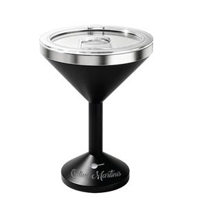 May include: A matte black martini glass with a stainless steel rim and a clear plastic lid. The base features a white graphic of an olive on a toothpick and the text Olive Martinis engraved in a cursive script font on the front of the stand.