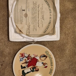 Norman Rockwell - The Christmas Surprise w CoA