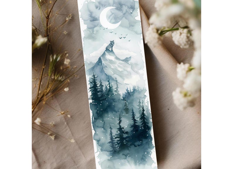 May include: Watercolor bookmark featuring a wolf on a mountain peak under a crescent moon. The landscape includes dark blue evergreen trees and a cloudy sky. The bookmark is a vertical rectangle.