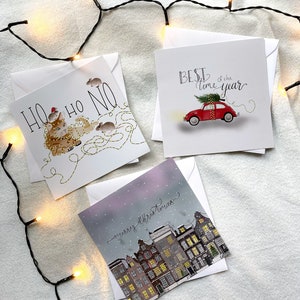 Conjunto de cartões de Natal com designs diversos - conjunto de 6 cartões com envelope branco - formato quadrado 15x15 cm, tema natalino, casas, carro, gato