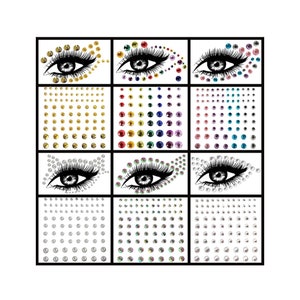 May include: A sheet of 10 different eye makeup designs featuring various coloured rhinestones. Each design includes a stylised eye with eyelashes and a cluster of rhinestones.