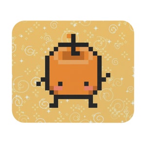 May include: A pixelated orange character with a smiling face and small arms and legs. The character is standing on a yellow background with a swirling pattern.