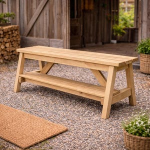 May include: A set of three ceramic mugs with a speckled, matte finish. The mugs are in shades of cream, light brown, and dark brown. Each mug has a simple, minimalist design and a rounded handle.