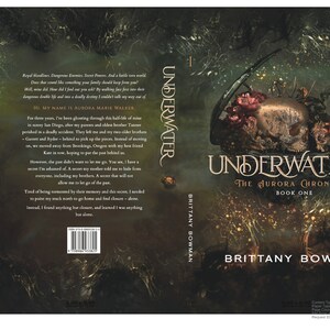 May include: Book cover for "Underwater: The Aurora Chronicles, Book One" by Brittany Bowman. The cover features a skull with flowers and vines growing from it, set against a dark, swirling background. The title "Underwater" is written in a stylized font.