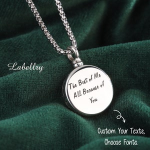 May include: A silver-colored pendant necklace with a round charm engraved with the text "The Best of Me All Because of You." The necklace has a chain and is displayed on a dark green fabric. The image also includes the text "Custom Your Texts, Choose Fonts."