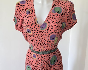 Vintage 1940s rayon summer dress with a surrealist print