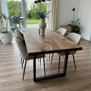 Solid walnut dining table with straight edge