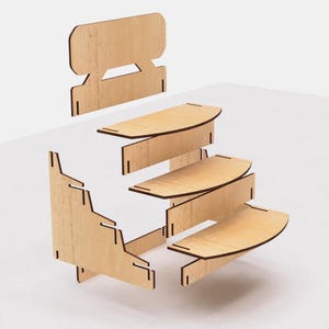 May include: A wooden display stand with four shelves, each with a curved front edge. The stand is assembled from five separate pieces, including a back panel.