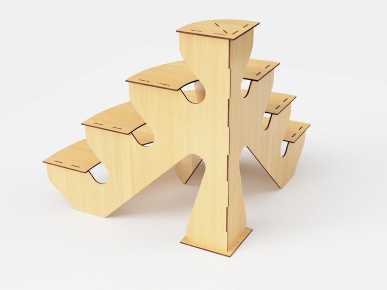 May include: A light-colored wooden display stand with multiple tiers. The stand has a unique, open design with curved edges and cut-out shapes. The tiers are connected by vertical supports, creating a multi-level structure. The stand is made of light-colored wood.