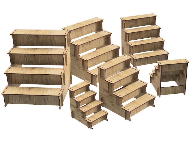 May include: Set of six wooden tiered display stands in various sizes. The stands are made of natural wood and have a rustic look. They are perfect for displaying small items, such as jewelry, candles, or other crafts.
