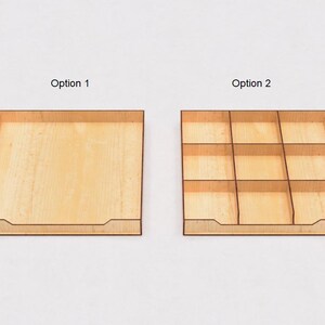 May include: Two wooden trays, one with a single compartment and the other with nine compartments. The trays are both light brown and have a slightly textured surface. The text "Option 1" is above the single compartment tray and the text "Option 2" is above the tray with nine compartments.