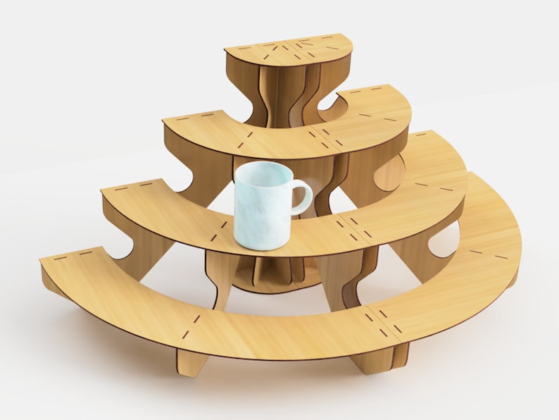 May include: A three-tiered, light-colored wooden display stand with a unique, curved design. The stand features a light blue mug on the middle tier. The stand is made of light-colored wood and has a modern, minimalist aesthetic.