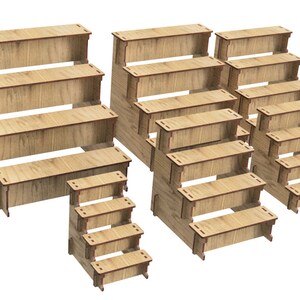 May include: Set of wooden display risers in various sizes. The risers are made of natural wood and have a rustic look. They are perfect for displaying products or crafts.