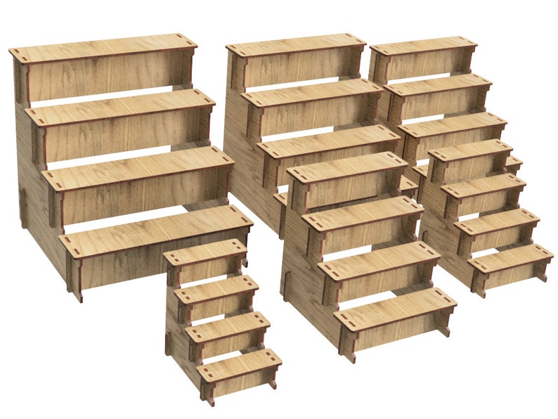 May include: Set of wooden display risers in various sizes. The risers are made of natural wood and have a rustic look. They are perfect for displaying products or crafts.