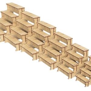 May include: A set of wooden tiered steps, made of light brown wood with red accents. The steps are arranged in a pyramid shape, with the largest step at the bottom and the smallest step at the top.