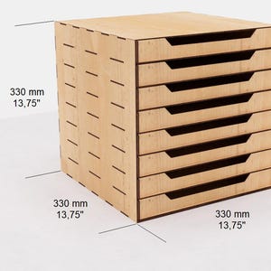May include: A wooden organizer with eight drawers, each measuring 13.75 inches in width and height. The organizer is made of light wood with a natural finish.
