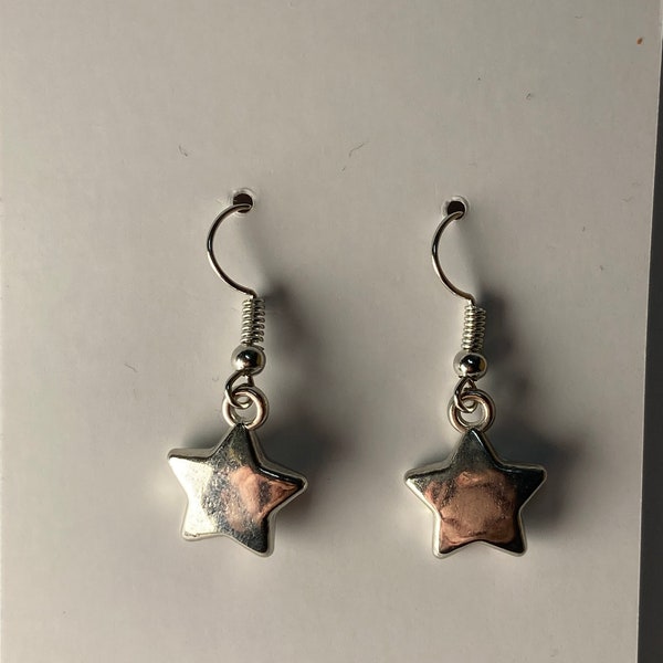 Tiny silver star earrings