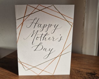 Happy Mother's Day card, Hand lettered in Modern Calligraphy style. With handdrawn metallic art deco frame.