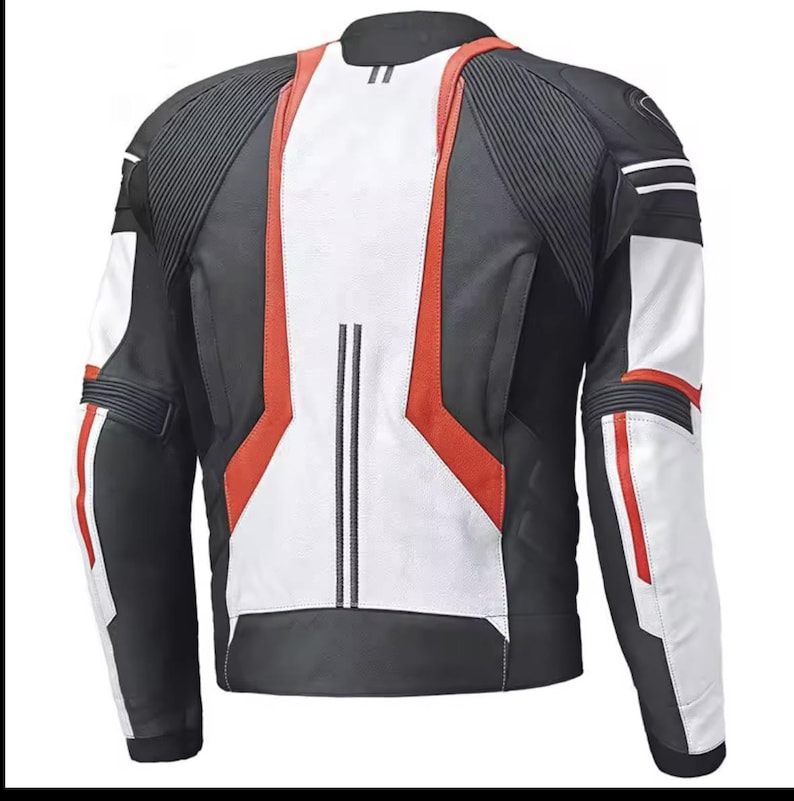 Pode incluir: Uma jaqueta de moto de couro preta, branca e vermelha com um design esportivo.