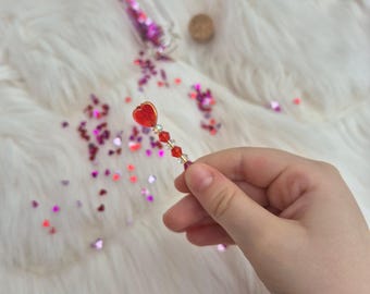 Liten tandfé-tavla, rött kristallhjärta, glitterflaska