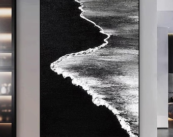 May include: A rectangular wall art piece featuring a high-contrast black and white abstract depiction of a shoreline. The composition shows a solid black area representing land meeting a textured white and gray ocean wave with foam.