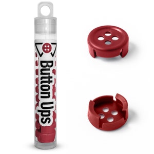 May include: A clear plastic tube filled with red button-shaped plastic fasteners. The tube has a white label that says "Button Ups". Two red plastic buttons are shown separately.