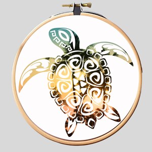 May include: A white silhouette of a turtle with a tropical sunset pattern inside. The turtle is in a wooden embroidery hoop.