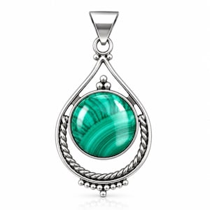 May include: A silver pendant featuring a round, polished malachite gemstone with dark green banded patterns. The stone is set within a teardrop-shaped frame accented with twisted rope detailing and small silver beads at the top and bottom points.