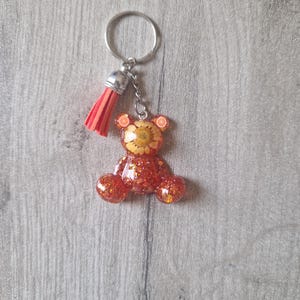 Orange teddy bear keychain, resin teddy bear bag charm, gift idea, resin bear keychain with glitter.