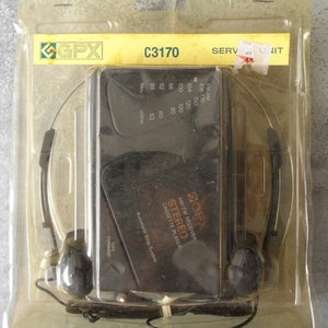 GPX C3170 AMFM Walkman Style Radio with Headphones circa 1979/80 in Original Case, unopened