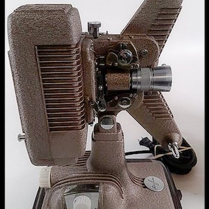 REVERE 8MM Projector with New LAMP (bulb), Reel, Case - SERVICED