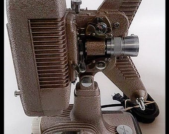 REVERE 8MM Projector with New LAMP (bulb), Reel, Case - SERVICED