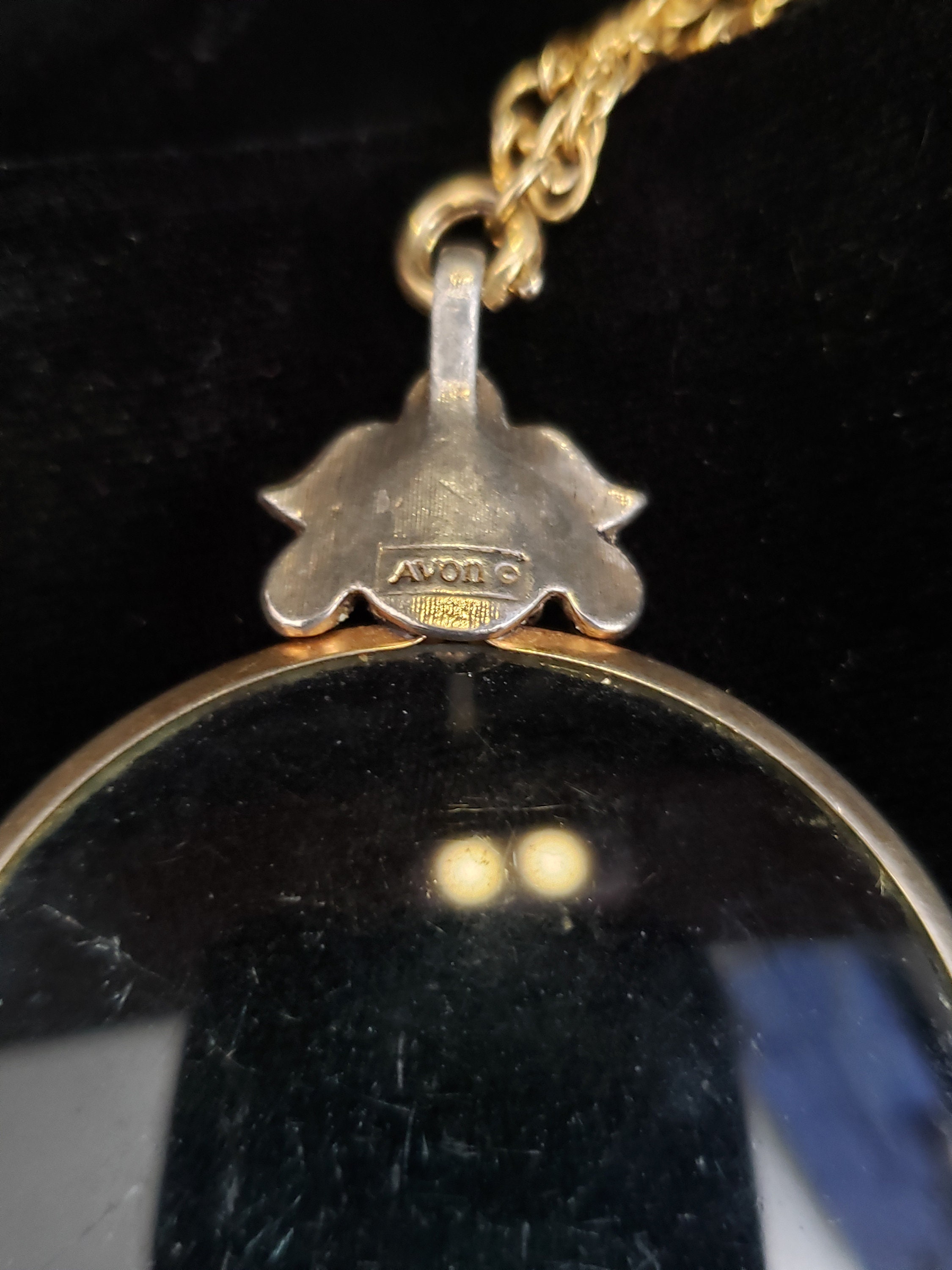 Avon magnifying glass best sale necklace