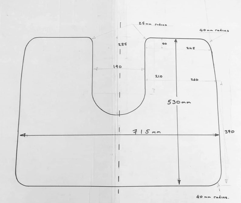 May include: A hand-drawn diagram of a U-shaped cutout with rounded corners and measurements in millimetres. The cutout is 715 mm wide, 530 mm tall, and has a 40 mm radius on the bottom corners and a 25 mm radius on the top corners.
